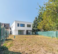 A family house on Kľukatá Street in Bratislava - Prievoz, surrounded by a green garden.