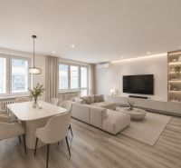 Living room in a three-room apartment with a sofa, dining table, and wooden decor flooring.