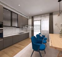 A kitchen with a wooden decor floor, a kitchen unit, and a dining table in a 3-room apartment.