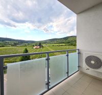 A balcony with a view of greenery in the Bratislava - Nové Mesto area on Jurská Street.