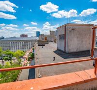 A view from the rooftop onto Krížna Street in Bratislava, in the Old Town, on a summer day.