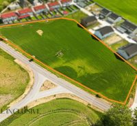 A view of a residential plot in Lehnice, surrounded by roads and green areas.