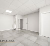 Bright commercial spaces with gray flooring and white doors.