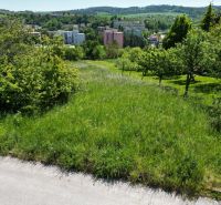 A garden plot for living in Myjava with a green meadow and a view of the city.