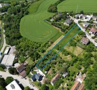 Aerial view of residential plots in Myjava near fields and houses.