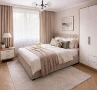A bedroom in a 3-room apartment with a comfortable bed and a floor with a wooden decor.