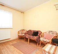 Rattan furniture in the living room, floor with wood decor, family house.