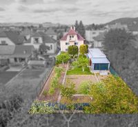 A family house on Niva Street in Trenčín surrounded by greenery and a garden.