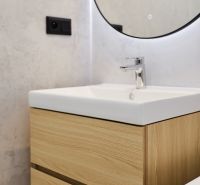 Bathroom cabinet with sink and mirror in a 4-room apartment.
