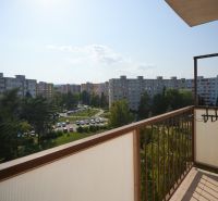 View from the balcony on Humenská, Košice - Západ district, with greenery and apartment buildings.