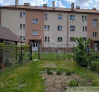 A container house and yard in Medzilaborce, suitable for a 2-room apartment, with a green lawn.