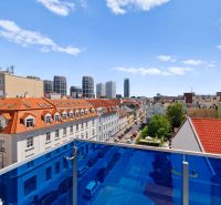 The view from the balcony of a 4-room apartment on Dunajská Street in Bratislava towards the high-rise buildings.