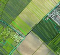 Aerial view of agricultural and forest lands near Továrenská Street in Smolenice.