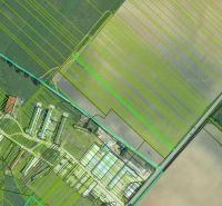Aerial view of agricultural and forest land in Smolenice on Továrenská Street.
