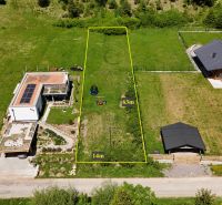 Residential plots in Rajecká Lesná with dimensions of 63 m x 14 m, surrounded by houses.