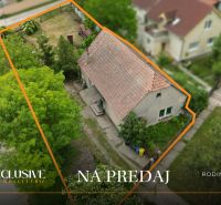 Family house in Lehnice with a plot bordered by greenery for sale.