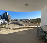 Balcony of a 3-room apartment in Iskele with a view of the sea and the city.