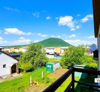 A view of the green landscape from the balcony on Matice Slovenskej Street in Veľký Šariš.