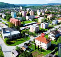 Aerial view of Veľký Šariš, Matice Slovenskej Street, near 2-bedroom apartments and grocery stores.