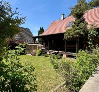 A family house at Devínske Jazero in Bratislava with a garden and a greenhouse.