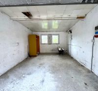 Spacious room with white walls, a wardrobe, and a window, Real estate - housing.