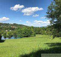 Beautiful natural scenery around Štiavnické Bane with a view of family houses.