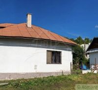 A family house in Štiavnické Bane with a gable roof and a garden.