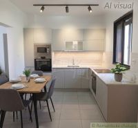 A kitchen in a family house with simple furniture and light gray cabinets.