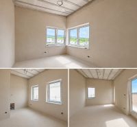 A spacious room with large windows in a 5 or more room apartment.