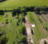 Meadows and trees in the Gardens in Hruboňovo create green spaces for cultivation.