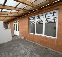 A terrace with a wooden decor roof in a 3-room apartment on Odborárov in Komárno.