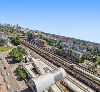 Kopčianska 10, Petržalka: Panorama of the Bratislava railway station and the surrounding urban development.