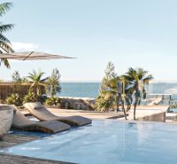 Luxury pool with loungers and ocean view in Nungwi.