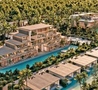 A resort in Nungwi surrounded by palm trees and water channels offers a unique tropical experience.