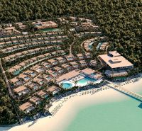 Aerial view of a beach resort in Nungwi with pools in a tropical country.