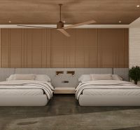 A bedroom with two beds, a ceiling fan, and a wooden decor floor in a villa.