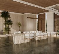 Spacious living room in a villa with wood-patterned flooring.