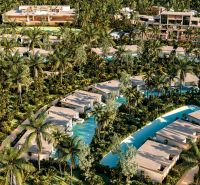 Luxury villas in Nungwi surrounded by palm trees and tropical vegetation.