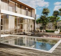 In Nungwi, there is a villa with a pool, sunbeds, and a terrace surrounded by palm trees.