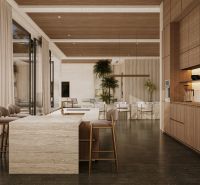 A spacious kitchen and dining room with stylish furniture and wood-patterned flooring in the villa.