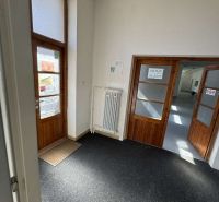 Carpet and wooden doors in commercial premises.