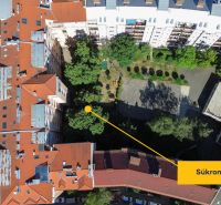 A top view of apartment buildings and greenery on Šancová Street in Bratislava - Nové Mesto.