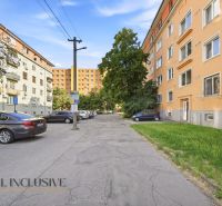 Kukučínova Street in Dunajská Streda with apartment buildings and parked cars, suitable for a 3-room apartment.