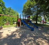Playground with swings and slides at the Cottage in Šaštín-Stráže on Do Gazárky street.