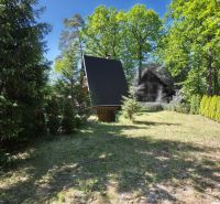A cottage in Šaštín-Stráže on Do Gazárky street, surrounded by greenery and trees.