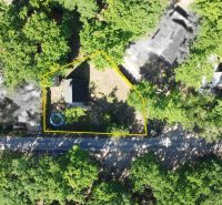 Aerial view of a cottage surrounded by greenery on Do Gazárky Street, Šaštín-Stráže.