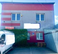 Commercial premises in Košice - Sever district with a van parked in front of the building.
