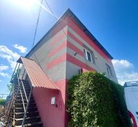 Commercial premises in Košice - Sever district, decorated with colorful stripes, external stairs.