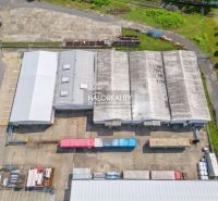 Production facilities in Považská Bystrica, storage buildings, industrial zone, aerial view.