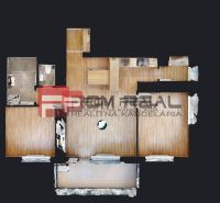 Floor plan of a 3-room apartment with wood-patterned flooring and a bathroom.